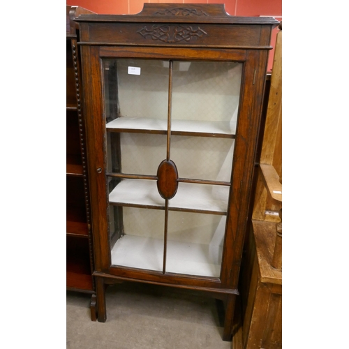 163 - Ann early 20th Century carved oak display cabinet