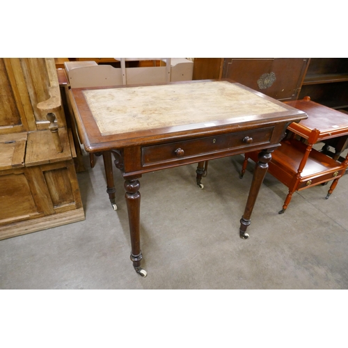 165 - A Victorian Heal & Son, London mahogany single drawer writing table