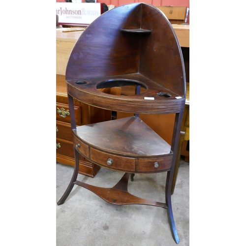 179 - A George III mahogany corner washstand