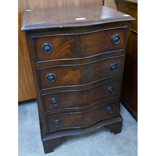 181 - A small George III style mahogany serpentine chest of drawers