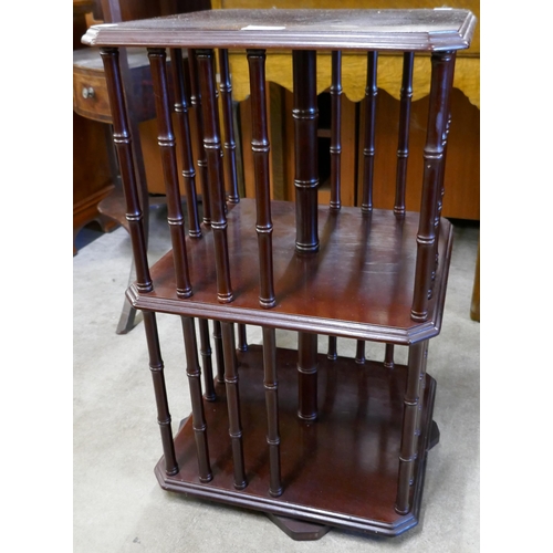 196 - A small mahogany revolving bookcase