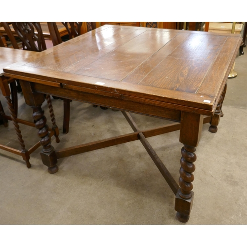 198 - An oak barleytwist draw-leaf table