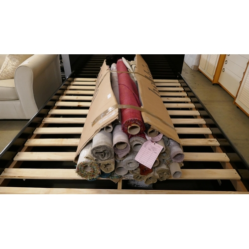 1522A - A box of upholstery fabric, rolls and part rolls