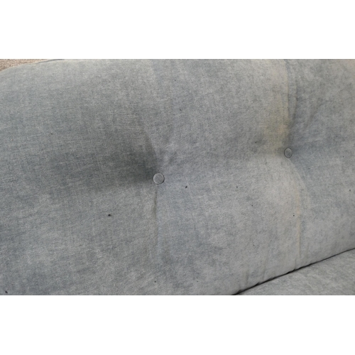 1333 - A steel blue velvet three seater sofa RRP £949