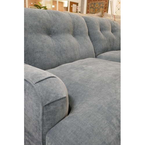 1333 - A steel blue velvet three seater sofa RRP £949