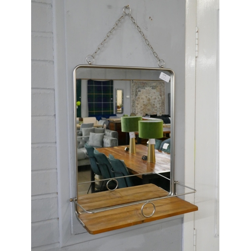 1374 - A wall hanging mirror with shelf