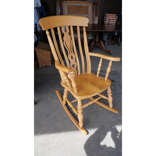 208 - A beech farmhouse rocking chair