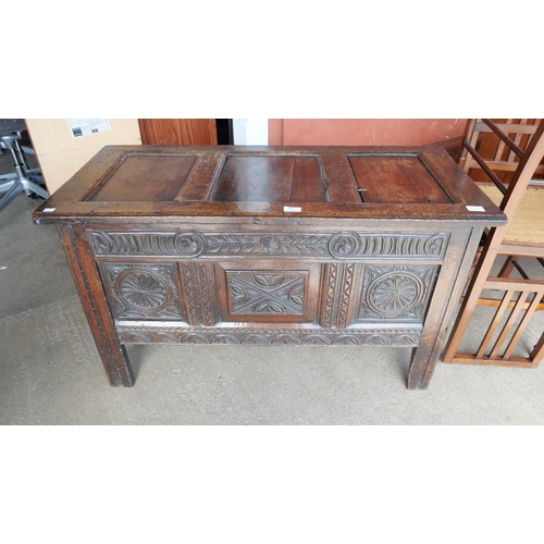 209 - A Charles II  carved oak coffer