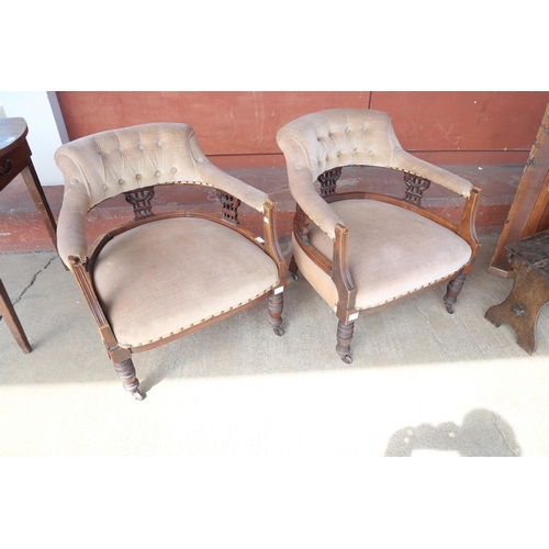 214 - A pair of Victorian walnut and fabric upholstered tub chairs