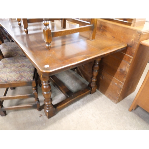 251 - A 17th Century style carved oak refectory table and six chairs