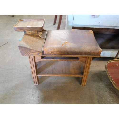 257 - A child's bamboo chair, a two tier trolley and a shoe shiners seat