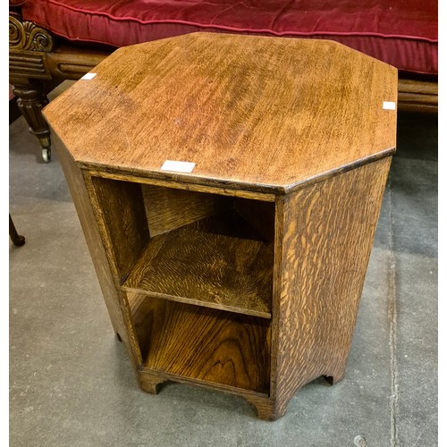 144 - A Heals style oak octagonal table