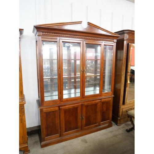 217 - A carved hardwood bookcase