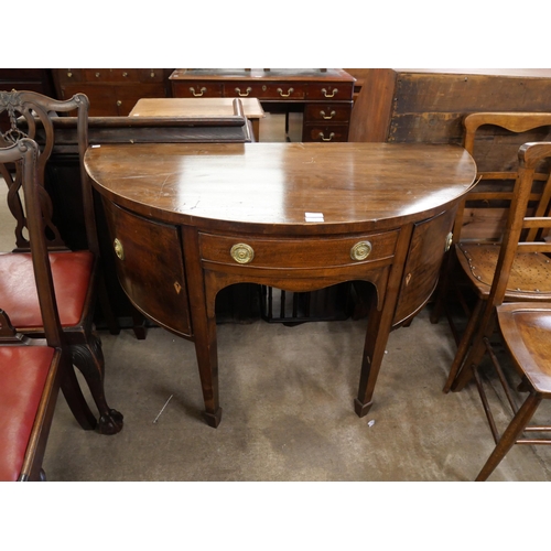 229 - A George III style mahogany demi lune sideboard