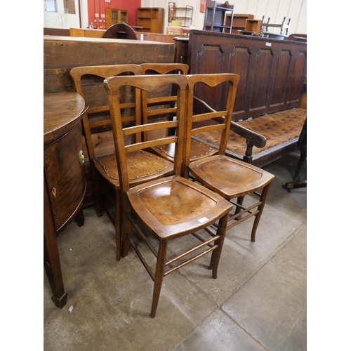 230 - A set of four early 20th Century beech chairs