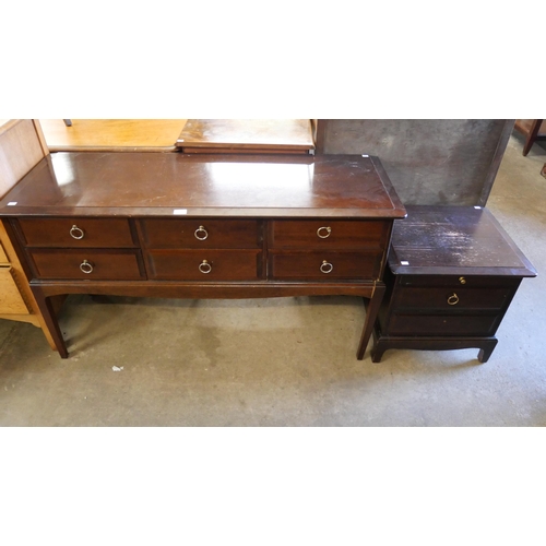 235 - A Stag Minstrel mahogany dressing table and bedside table