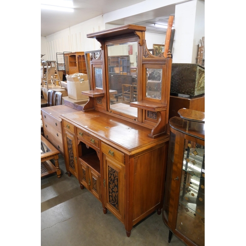 247 - A late Victorian carved walnut mirrorback chiffonier