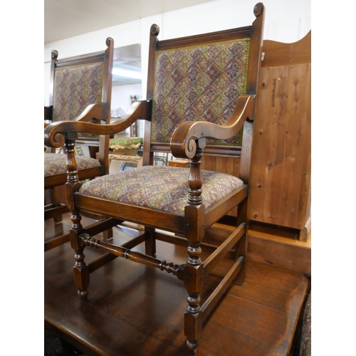 251 - A 17th Century style carved oak refectory table and six chairs