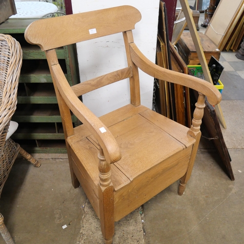 264 - A Victorian pine commode chair