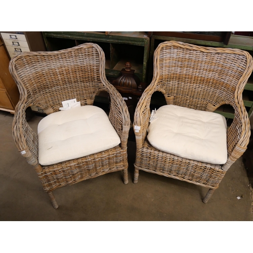 265 - A pair of wicker garden chairs