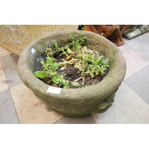 290 - A circular concrete garden planter