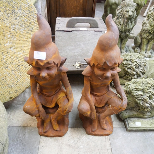 291 - A pair of cast iron garden figure of a pixies