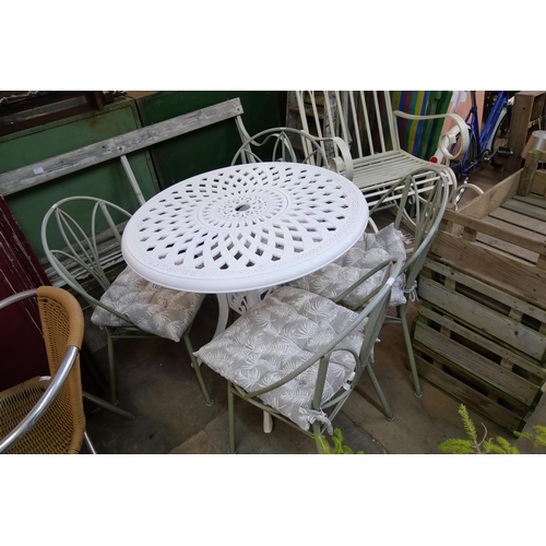 302 - A white painted aluminium garden table and four teal coloured chairs