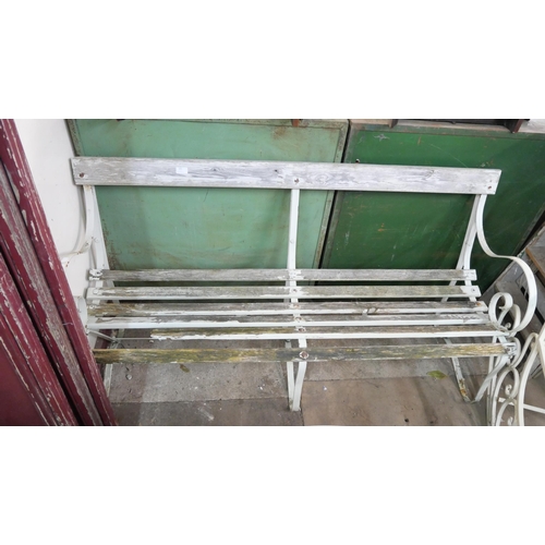 305 - A wrought iron garden bench