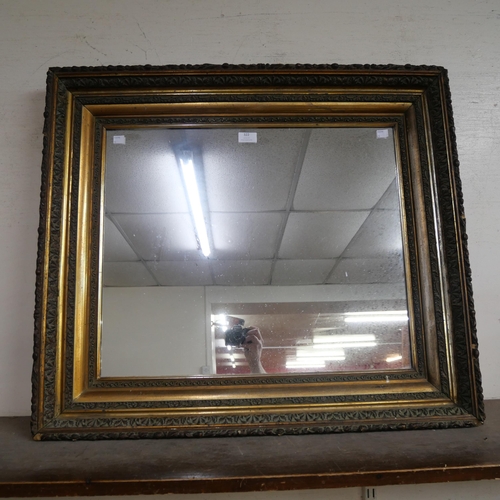 322 - A Victorian giltwood and gesso framed mirror