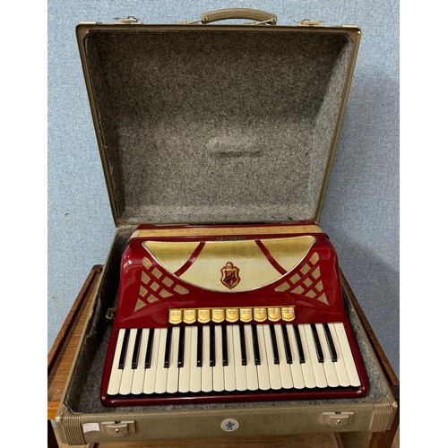 348 - A cased Hohner accordion