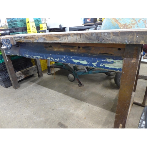 2268 - A 7' wooden work bench with a Woden no.192 joiners vice