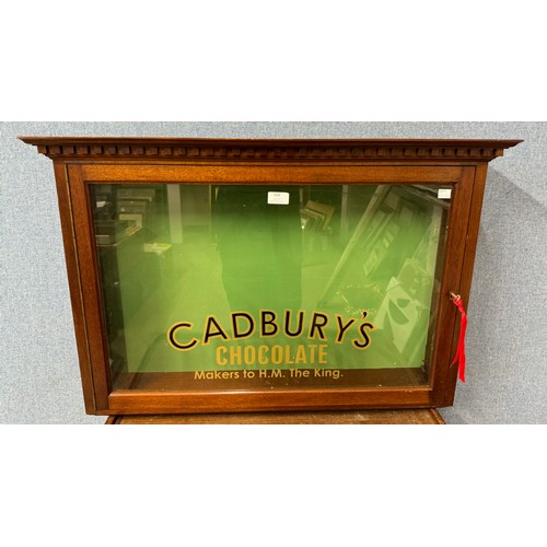 368 - A mahogany shop display cabinet, bearing Cadbury's inscription