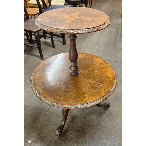 114A - A Victorian burr walnut circular two tier dumb waiter