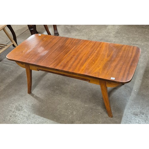 11 - A walnut rectangular extending coffee table