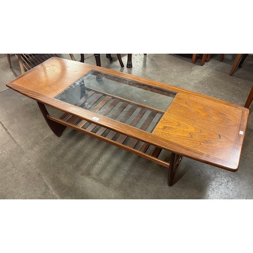 13 - A G-Plan Astro teak and glass topped rectangular coffee table