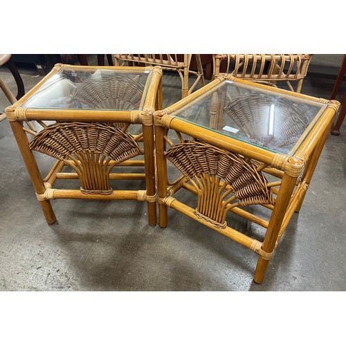 17 - A pair of Italian bamboo and glass topped occassional tables