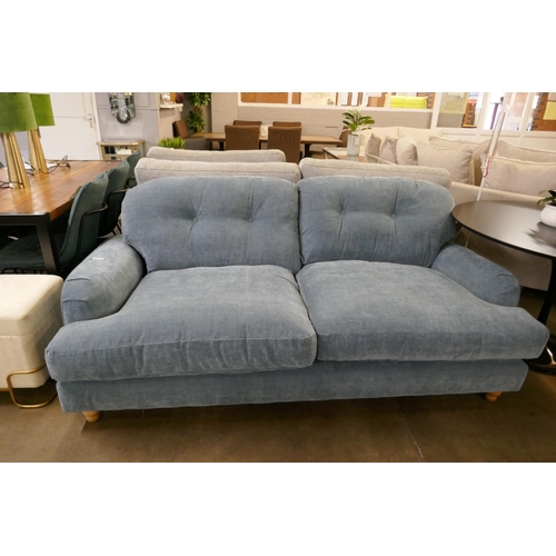 1327 - A steel blue velvet three seater sofa RRP £949