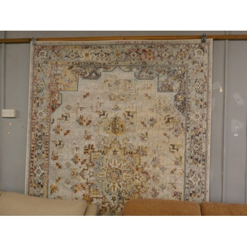 1351 - A multi-coloured ground vintage look carpet, 200 x 300cm