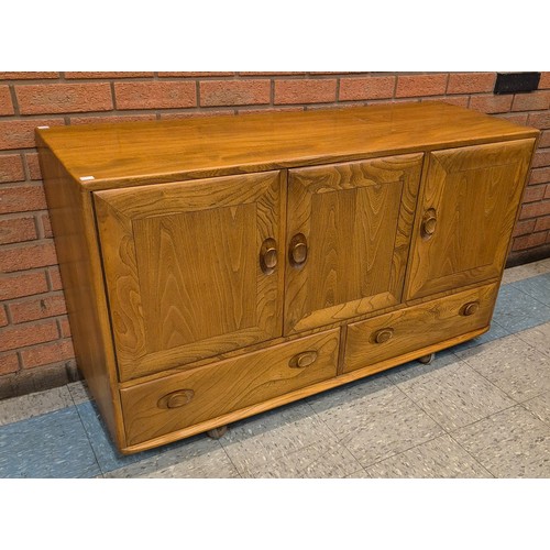 37 - An Ercol Blonde elm Windsor sideboard