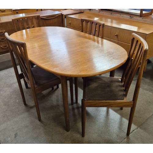 43 - A Meredew teak extending dining table and four chairs