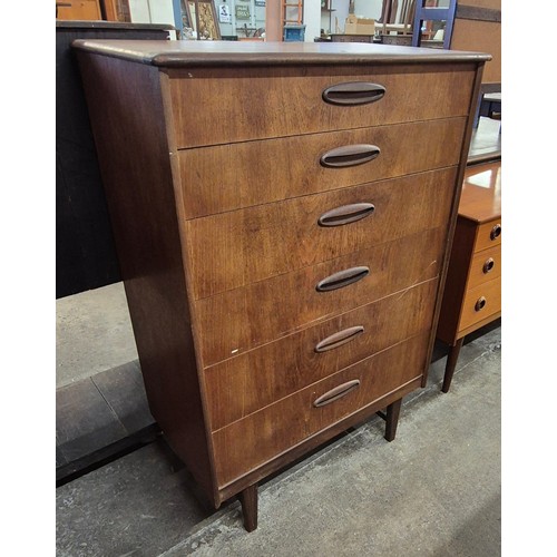 50 - A teak chest of drawers