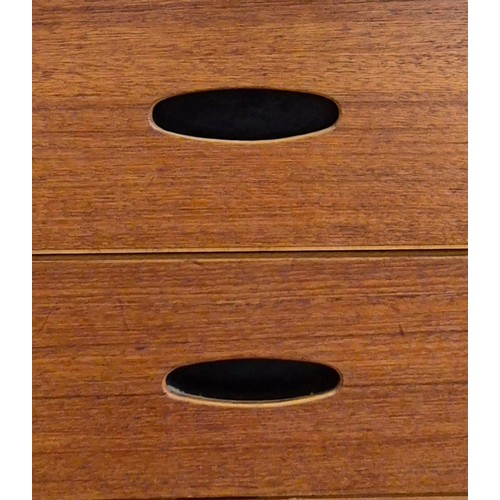 52 - An Austin Suite teak chest of drawers