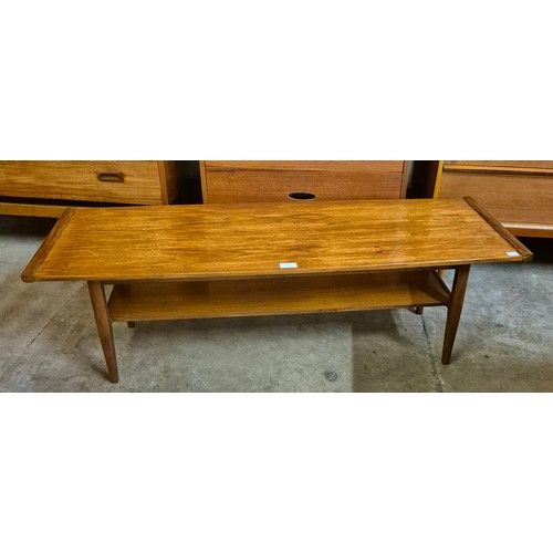 61 - A teak coffee table