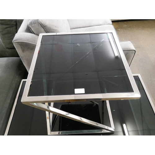 1377 - A Chrome and black glass coffee table and lamp table *This lot is subject to VAT