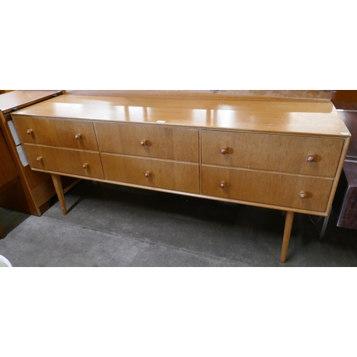 81 - A teak sideboard, retailed by Heals