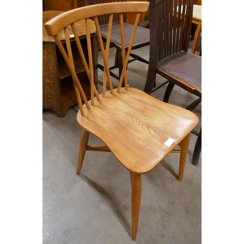 93 - An Ercol Blonde elm and beech candlestick chair