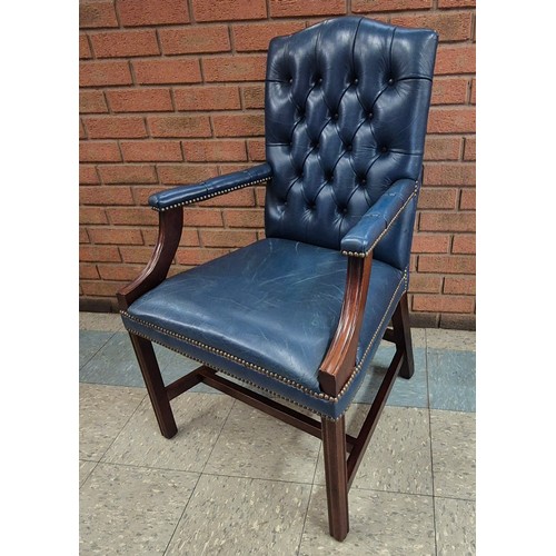 129 - A mahogany and blue leather Gainsborough style chair