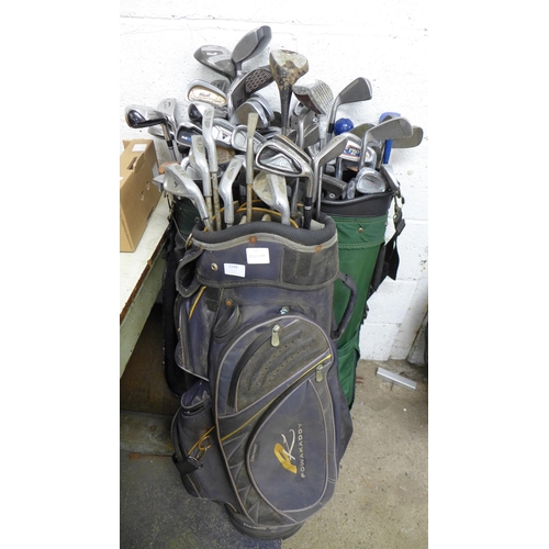 2254 - 5 Bags of golf irons, drivers and putters including Big Ezee, Ram, Delta, Donnay and Spalding and Se... 