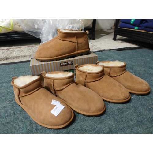 3261 - Three pairs  of women's chestnut coloured Shearling boots, mixed size *This lot is subject to VAT