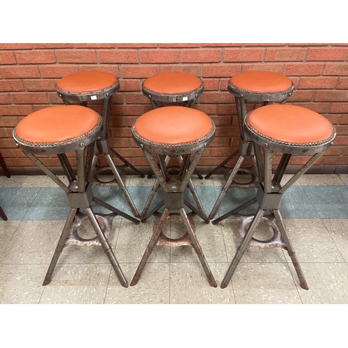 22 - A set of six industrial style chrome bar stools